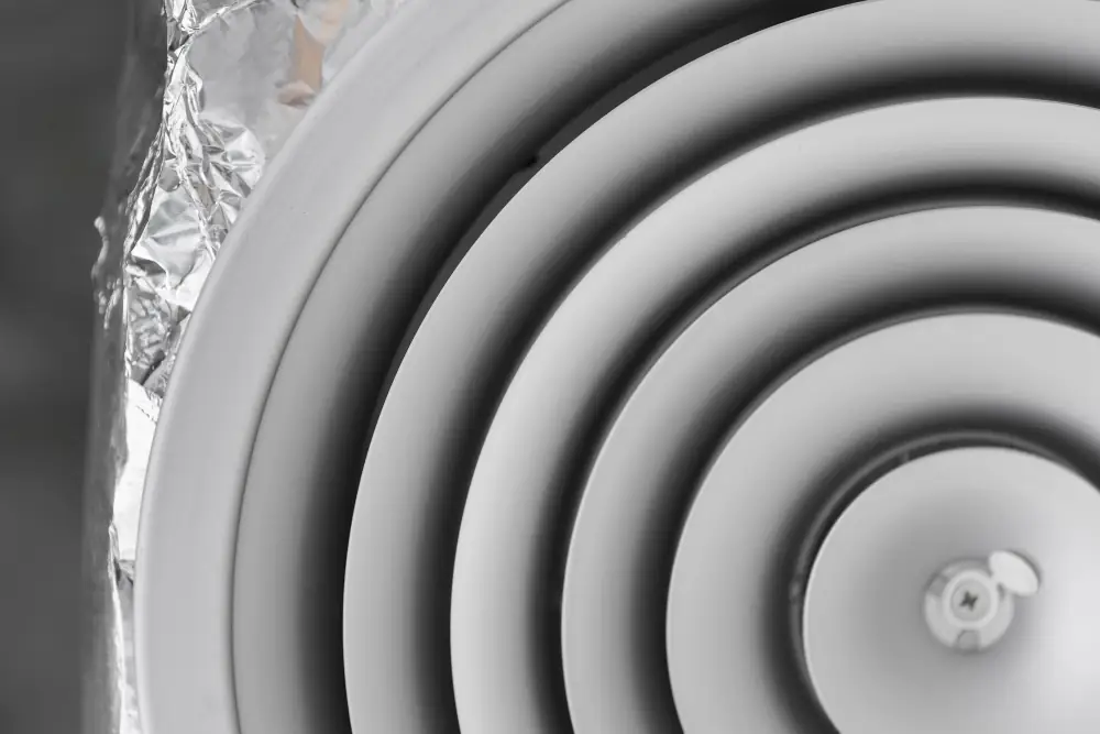 Detail van een rond ventilatierooster